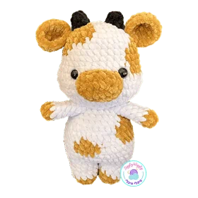 פרה לבנה עם כתמים