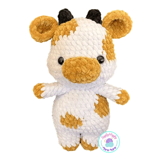 פרה לבנה עם כתמים