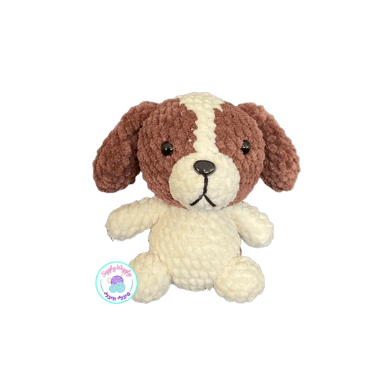 גור בצבע קרם עם אוזניים חומות